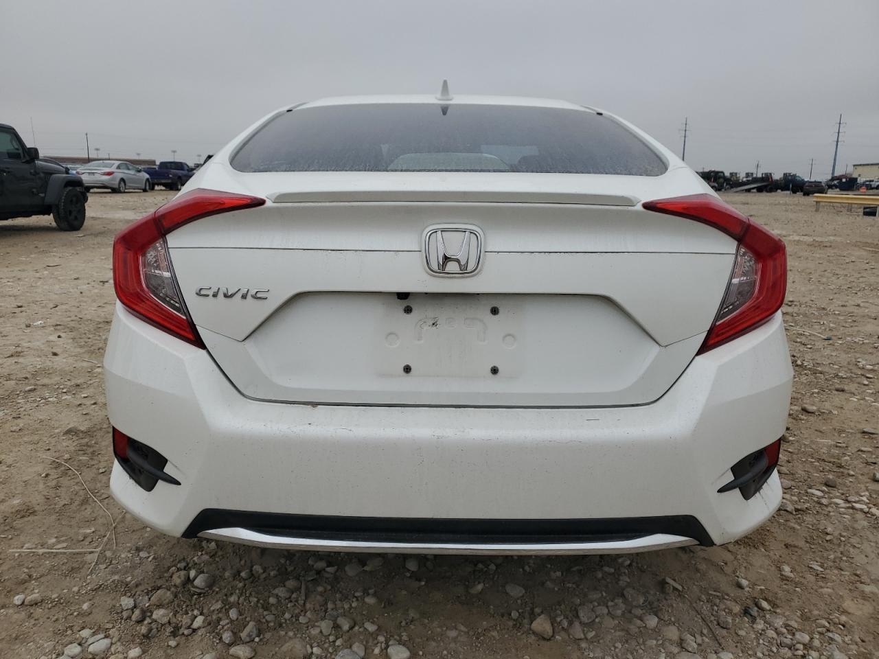 2020 Honda Civic VIN 19XFC1F79LE009996 Copart auction photo, front end / minor dent/scratches damage thumbnail 6