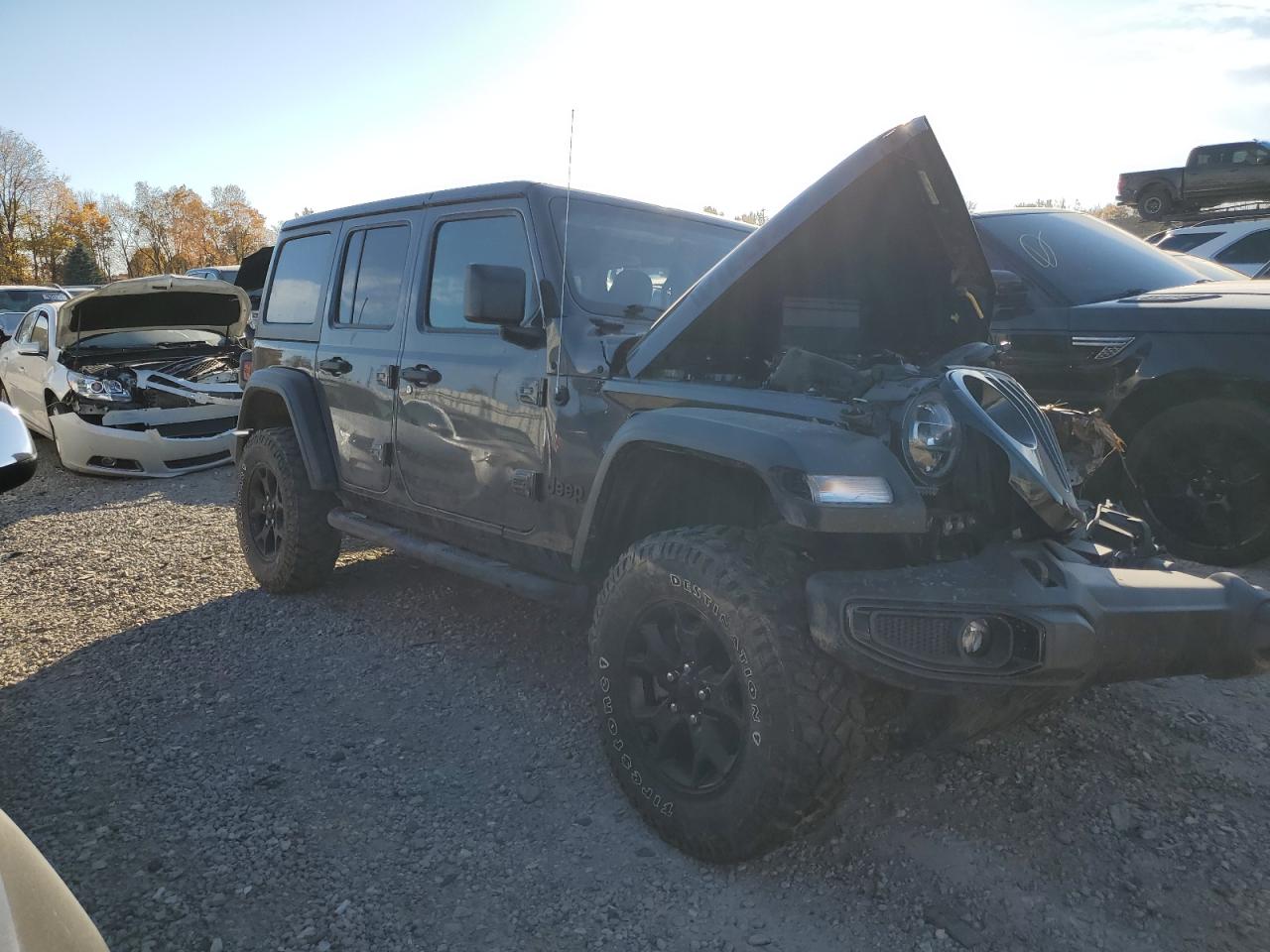 2021 Jeep Wrangler VIN 1C4HJXDN7MW599321 Copart auction photo, front end / all over damage thumbnail 4
