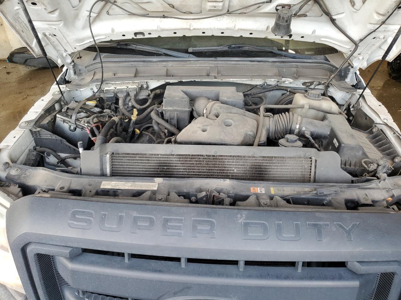 2012 Ford F250 VIN 1FT7X2A63CEB54671 Copart auction photo, side / front end damage thumbnail 12