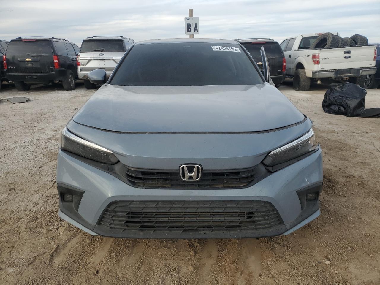 2022 Honda Civic VIN 2HGFE1F90NH315375 Copart auction photo, side / front end damage thumbnail 5