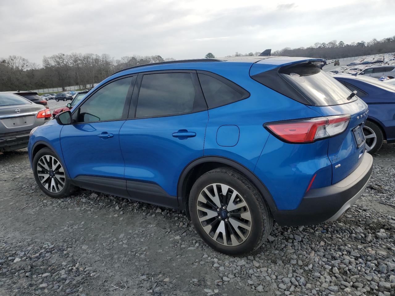 2020 Ford Escape VIN 1FMCU0BZ9LUA06935 Copart auction photo, side / front end damage thumbnail 2