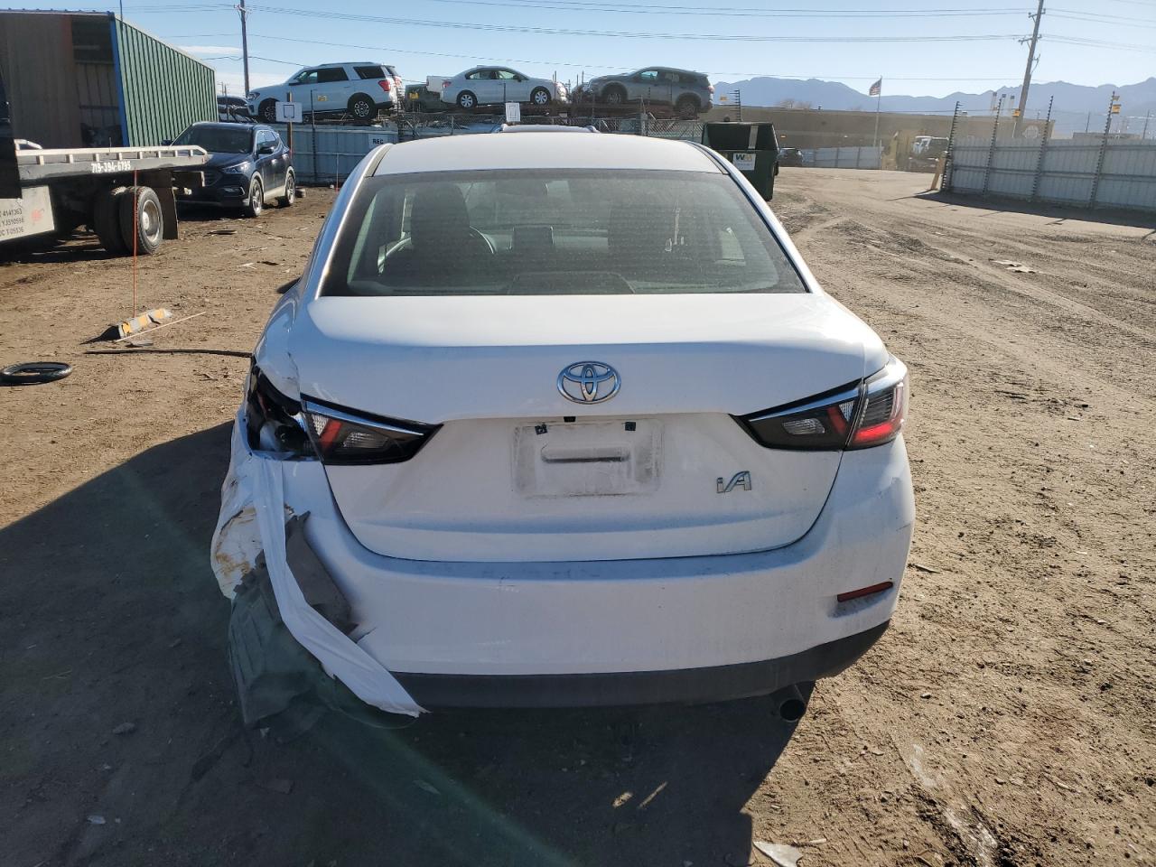 2017 Toyota Yaris VIN 3MYDLBYV6HY179698 Copart auction photo, side / rear end damage thumbnail 6
