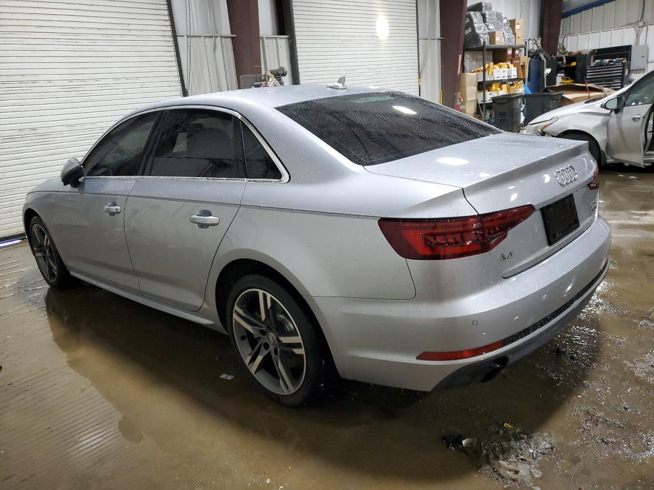 2018 Audi A4 VIN WAUENAF45JN009785 Copart auction photo, vandalism damage thumbnail 2