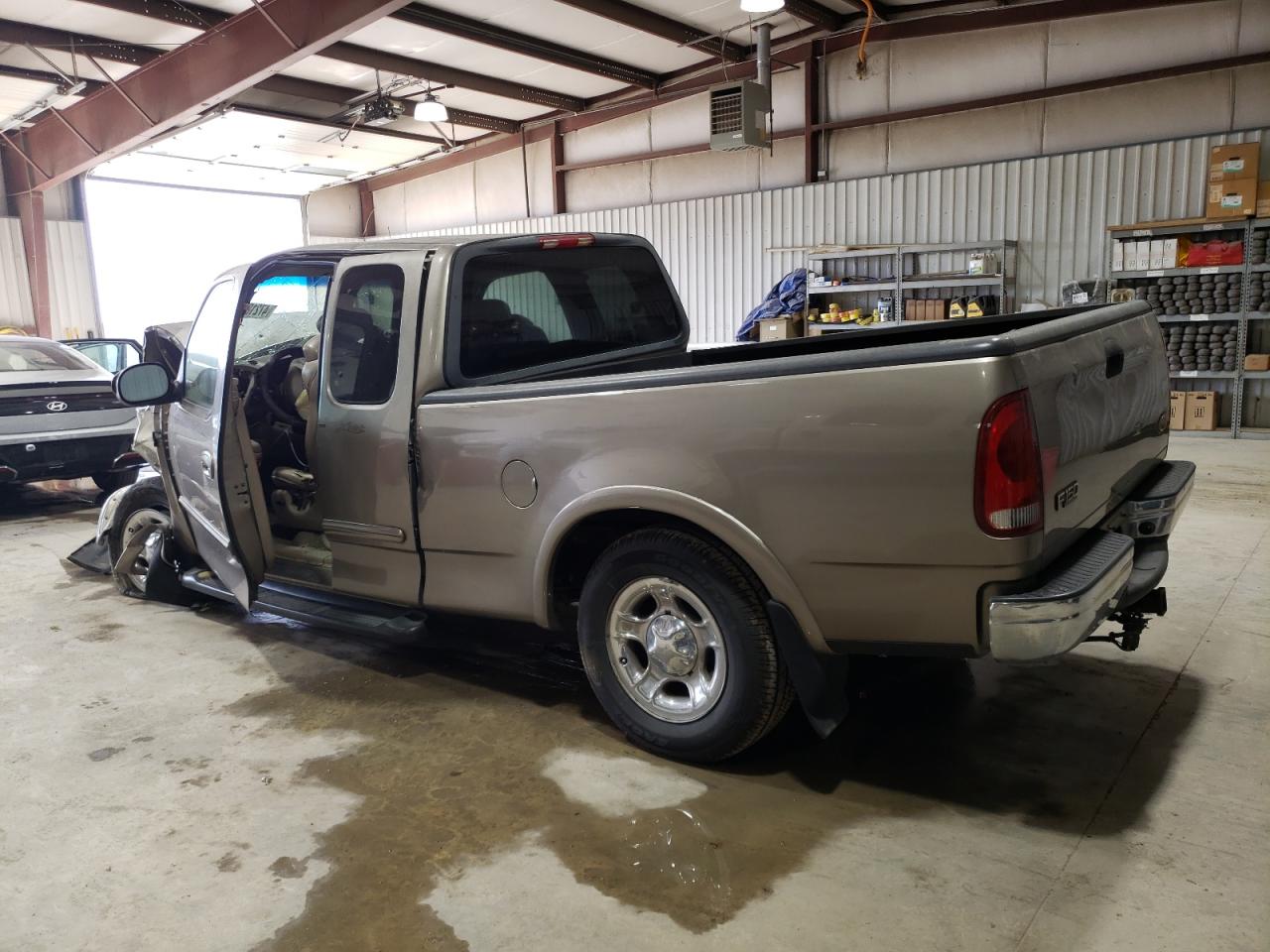 2003 Ford F-150 VIN 1FTRX17W63NB22887 Copart auction photo, front end / all over damage thumbnail 2