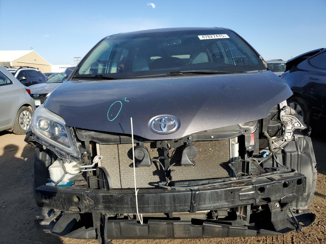 2015 Toyota Sienna VIN 5TDDK3DC0FS105371 Copart auction photo, front end / all over damage thumbnail 5