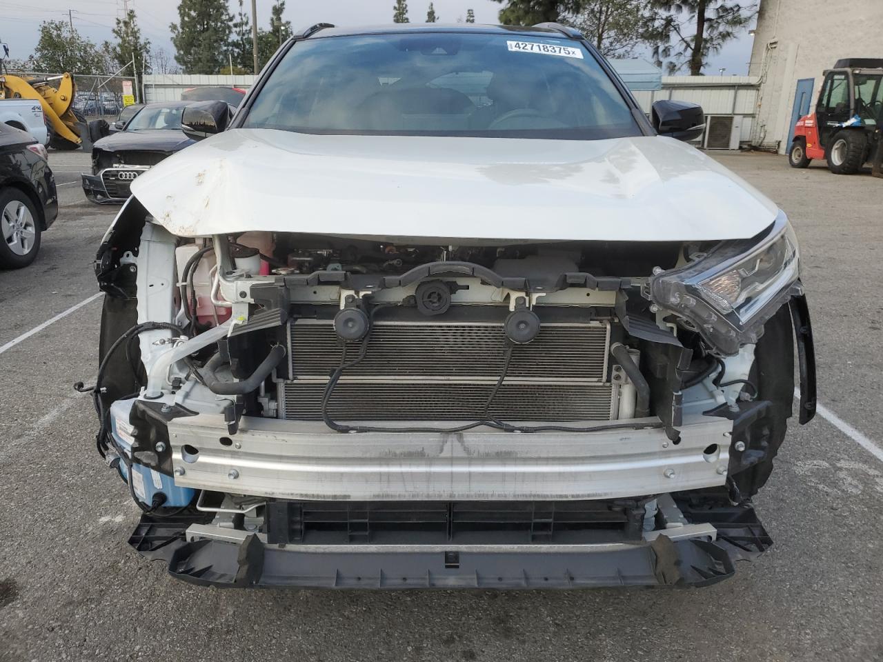 2021 Toyota RAV 4 VIN 4T3E6RFV0MU044528 Copart auction photo, rear end / front end damage thumbnail 5