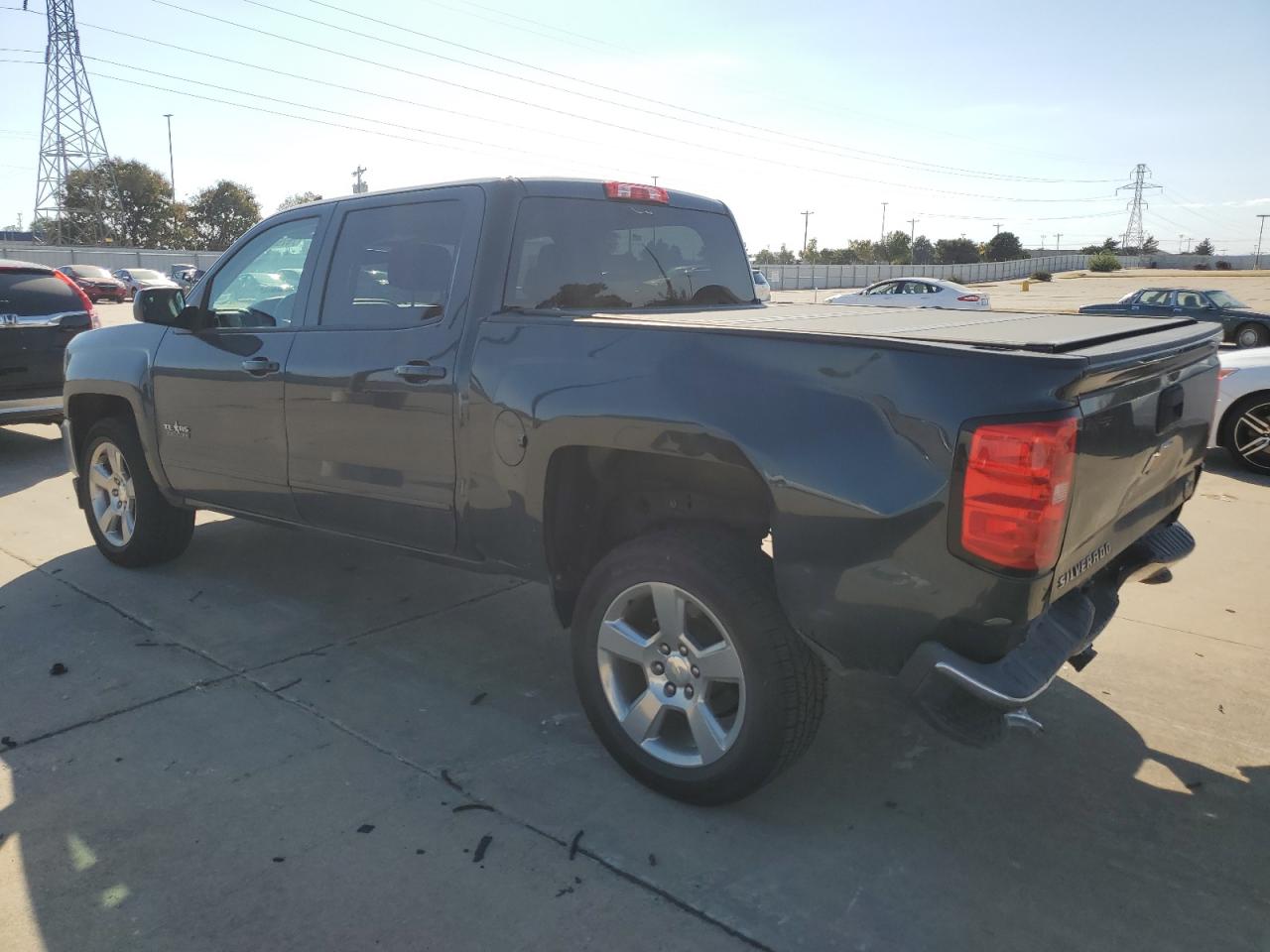 2018 Chevrolet Silverado VIN 3GCPCREC3JG361085 Copart auction photo, rear end / minor dent/scratches damage thumbnail 2