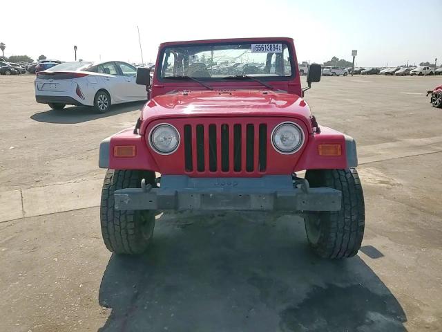 2000 Jeep Wrangler VIN 1J4FA49S1YP719709 Copart auction photo, side damage thumbnail 11