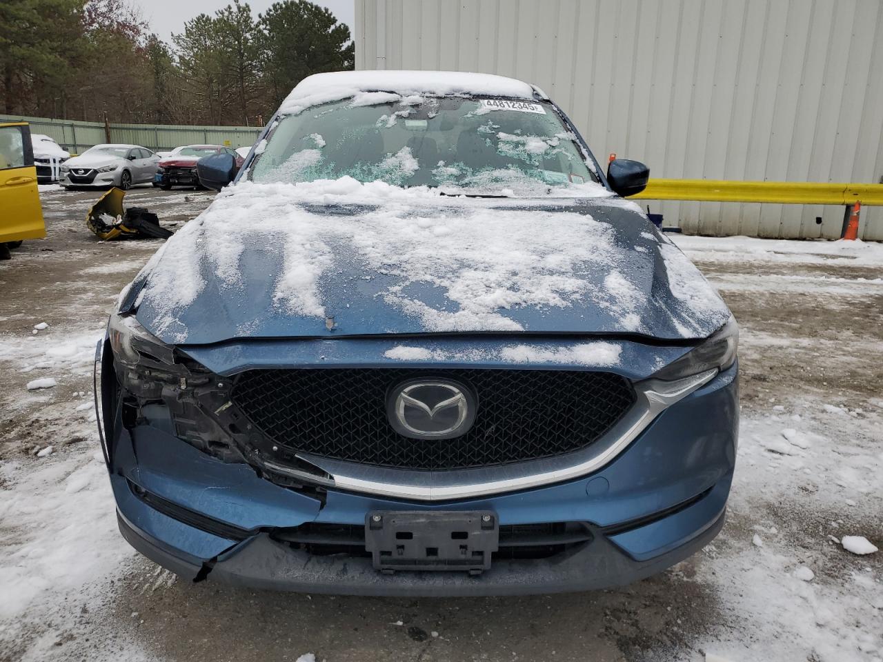 2021 Mazda CX-5 VIN JM3KFBAY1M0313207 Copart auction photo, front end / side damage thumbnail 5