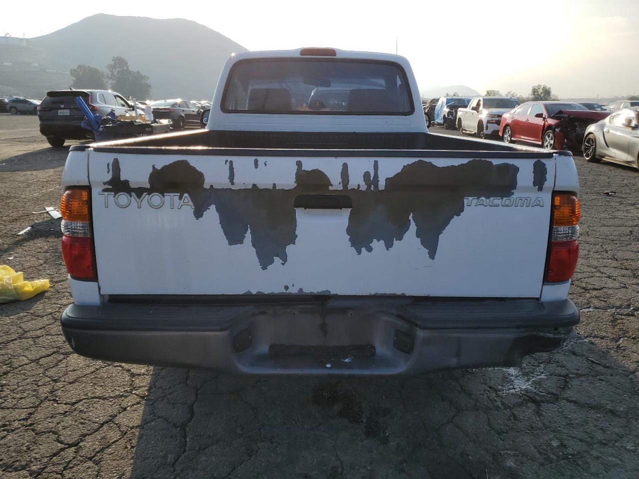 2001 Toyota Tacoma VIN 5TENL42N01Z768799 Copart auction photo, front end damage thumbnail 6