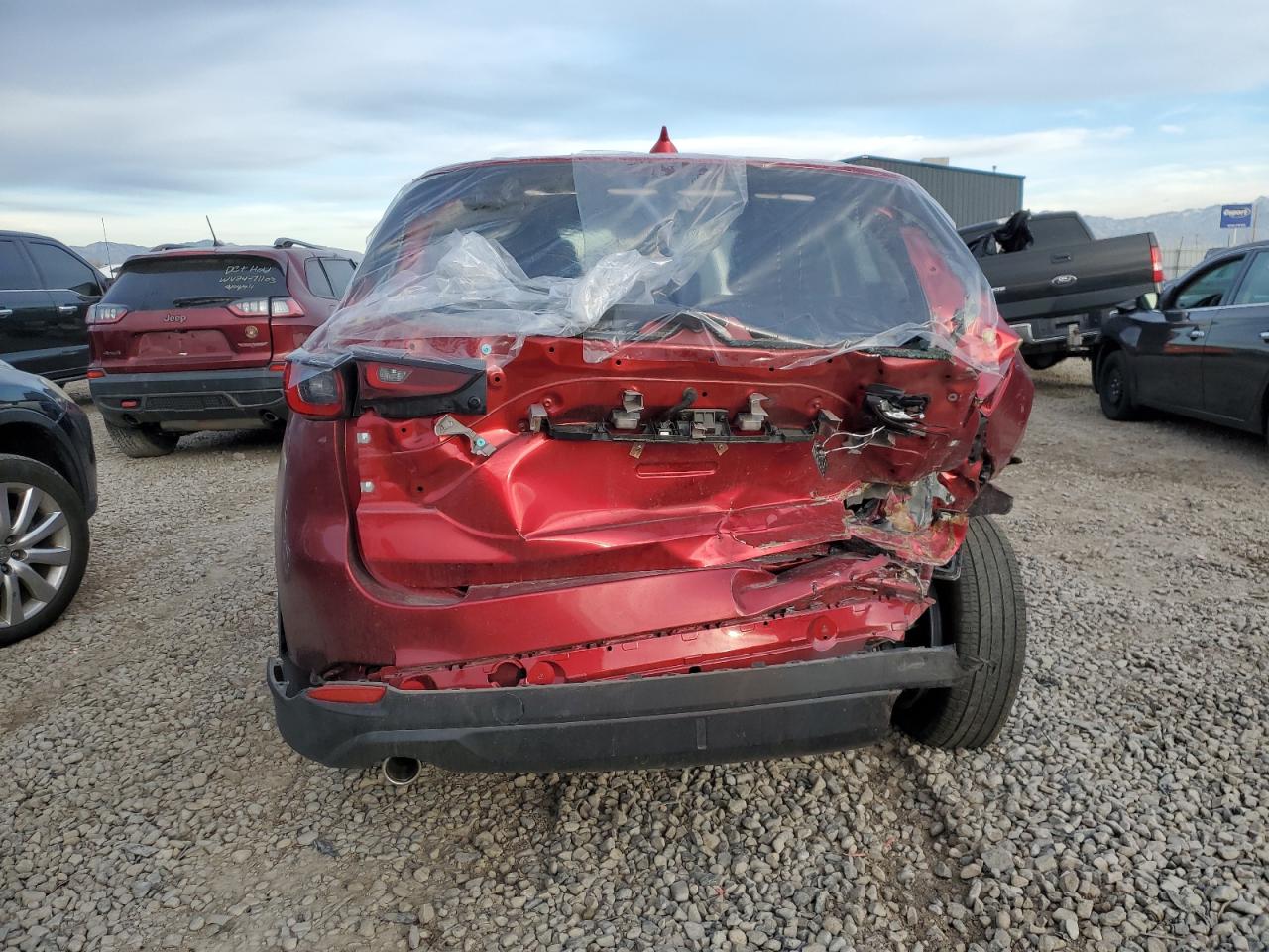 2022 Mazda CX-5 VIN JM3KFBAM1N1571509 Copart auction photo, side / rear end damage thumbnail 6