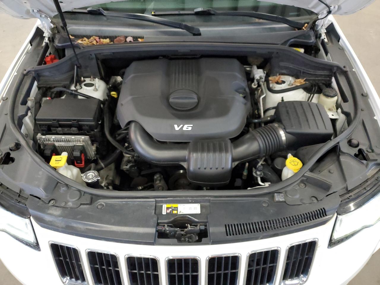 2014 Jeep Grand Cherokee VIN 1C4RJFBG7EC535382 Copart auction photo, all over damage thumbnail 12