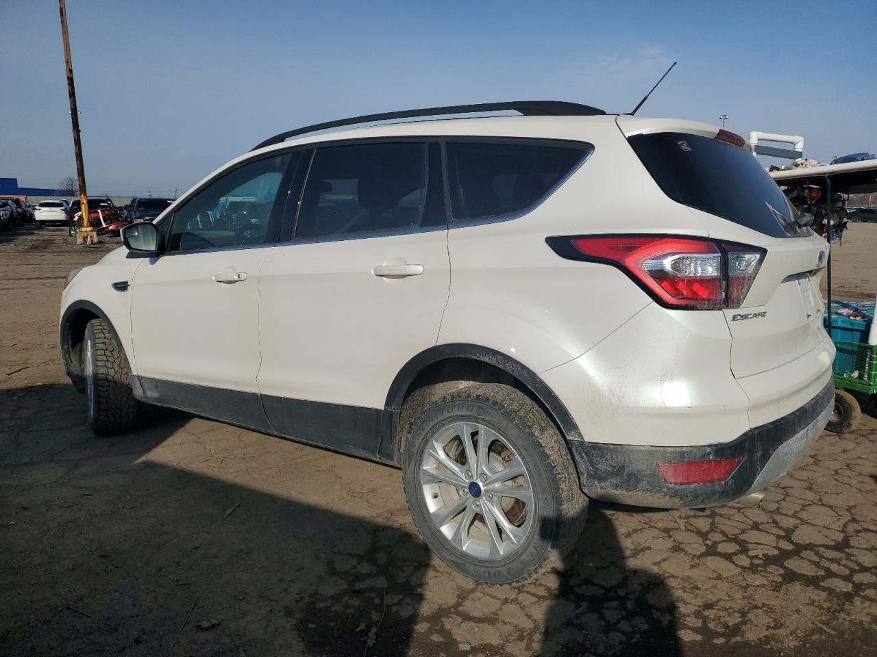2018 Ford Escape VIN 1FMCU9GD2JUD56034 Copart auction photo, side damage thumbnail 2