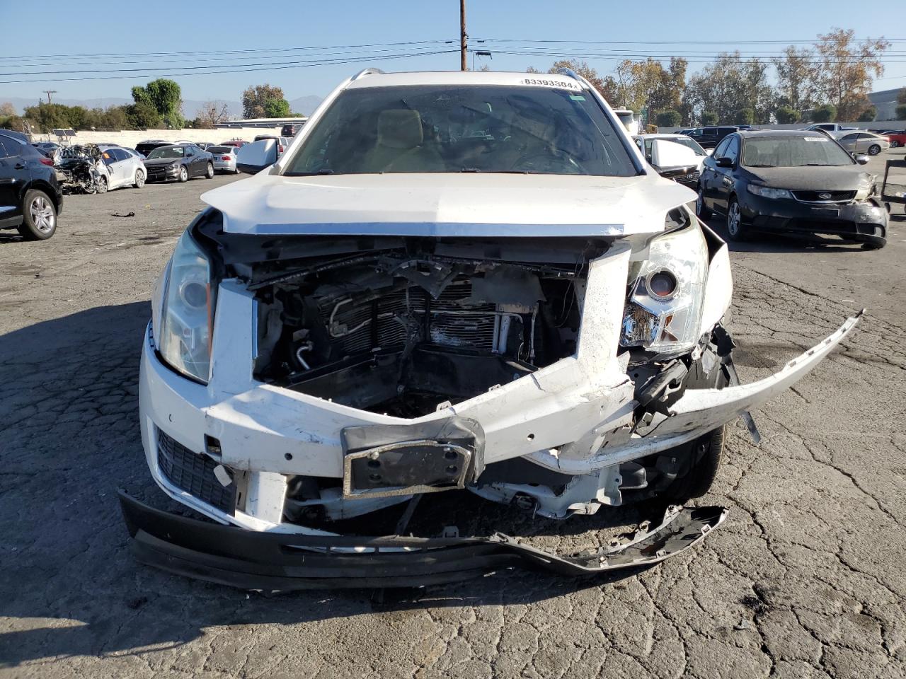 2016 Cadillac SRX VIN 3GYFNBE3XGS561264 Copart auction photo, front end damage thumbnail 5