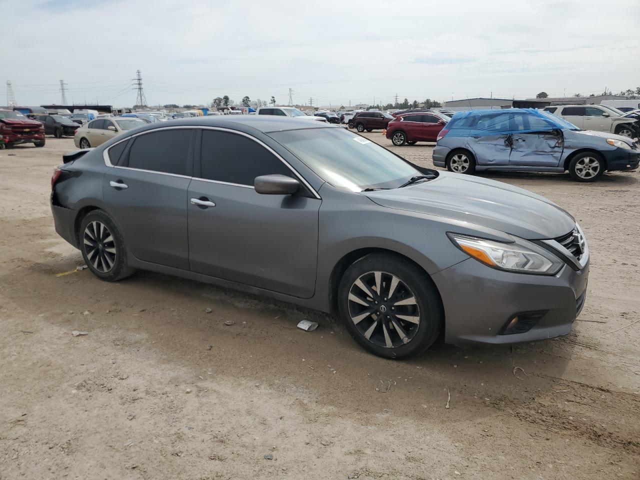 2018 Nissan Altima VIN 1N4AL3AP1JC179731 Copart auction photo, rear end / minor dent/scratches damage thumbnail 4