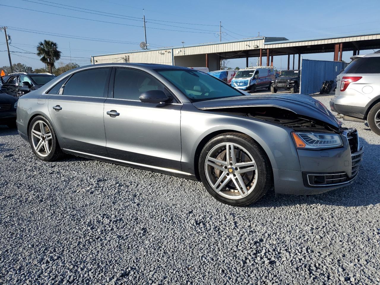 2015 Audi A8 VIN WAU32AFD4FN041442 Copart auction photo, front end damage thumbnail 4