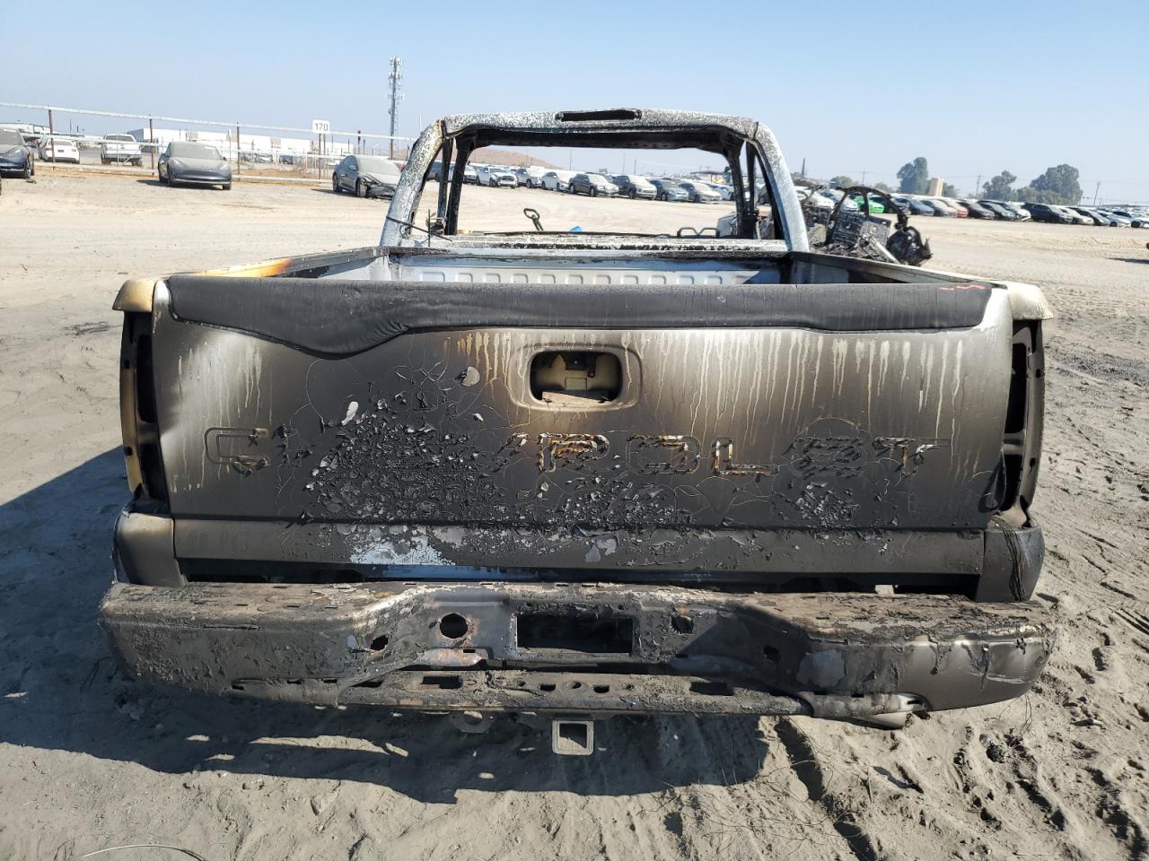 2003 Chevrolet Silverado VIN 1GCEC14X03Z168733 Copart auction photo, burn damage thumbnail 6