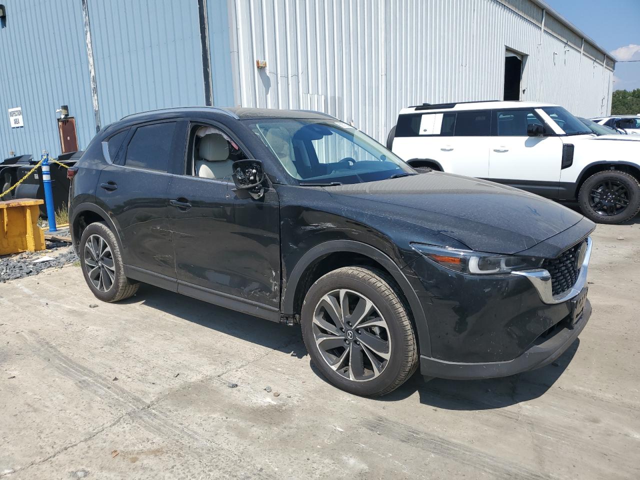 2023 Mazda CX-5 VIN JM3KFBDM7P0251633 Copart auction photo, side / minor dent/scratches damage thumbnail 4