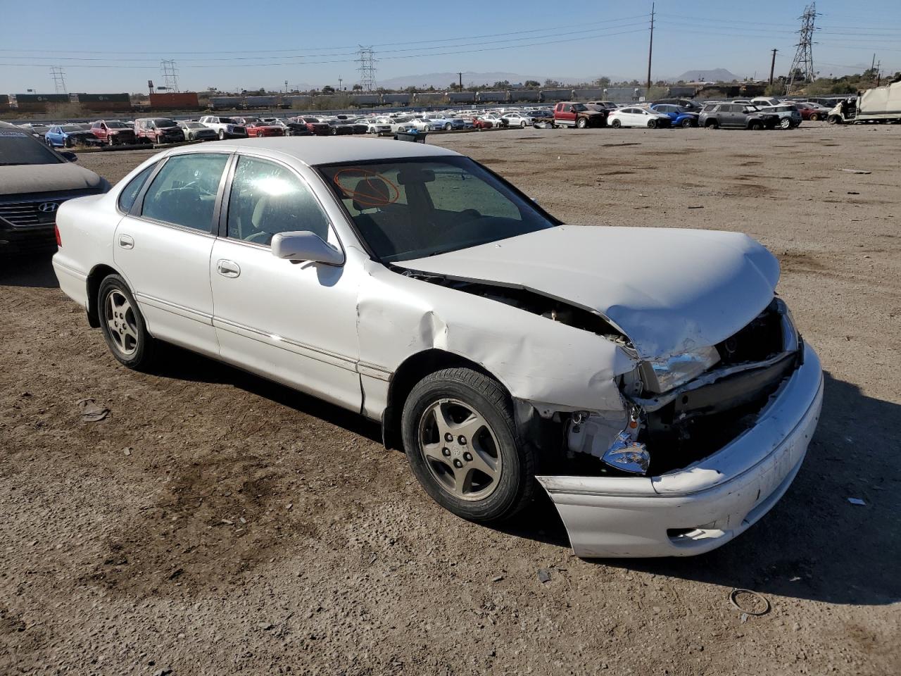 1999 Toyota Avalon VIN 4T1BF18B9XU336408 Copart auction photo, front end / frame damage damage thumbnail 4