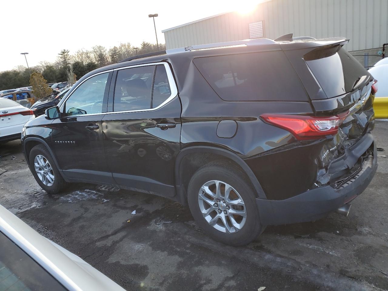2018 Chevrolet Traverse VIN 1GNEVGKWXJJ196615 Copart auction photo, rear end / minor dent/scratches damage thumbnail 2