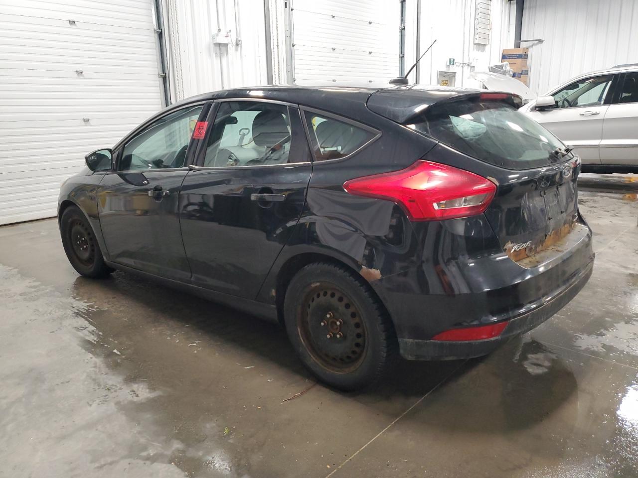 2015 Ford Focus VIN 1FADP3K2XFL359138 Copart auction photo, biohazard/chemical / front end damage thumbnail 2