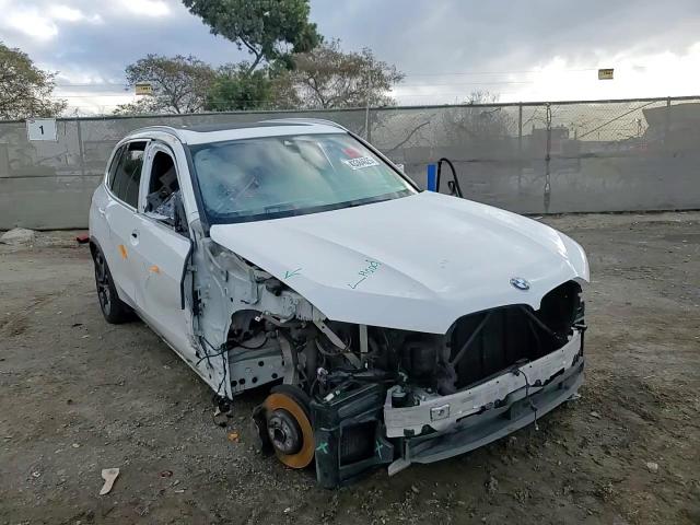 2021 BMW X5 VIN 5UXCR4C04M9E59055 Copart auction photo, front end / side damage thumbnail 11