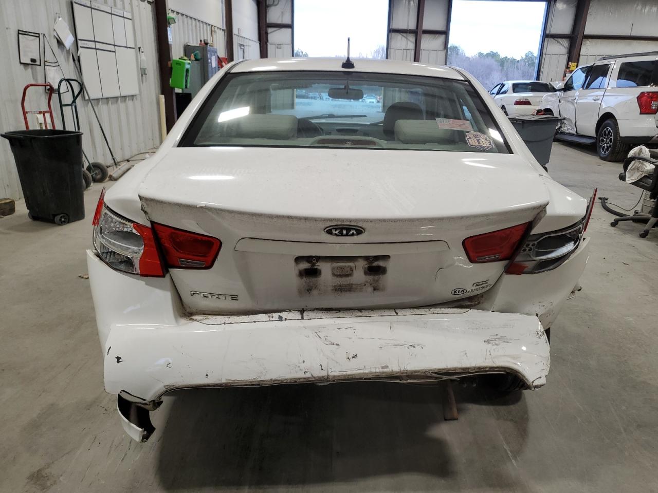 2010 KIA Forte VIN KNAFU4A21A5856625 Copart auction photo, front end / rear end damage thumbnail 6