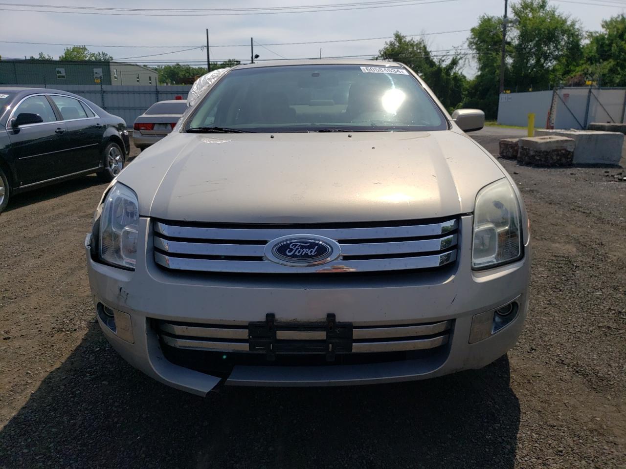 2009 Ford Fusion VIN 3FAHP08159R113232 Copart auction photo, front end / side damage thumbnail 5