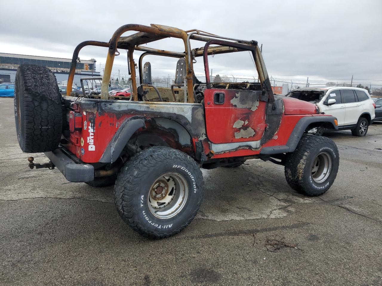 1999 Jeep Wrangler VIN 1J4FY19S0XP455035 Copart auction photo, burn damage thumbnail 3