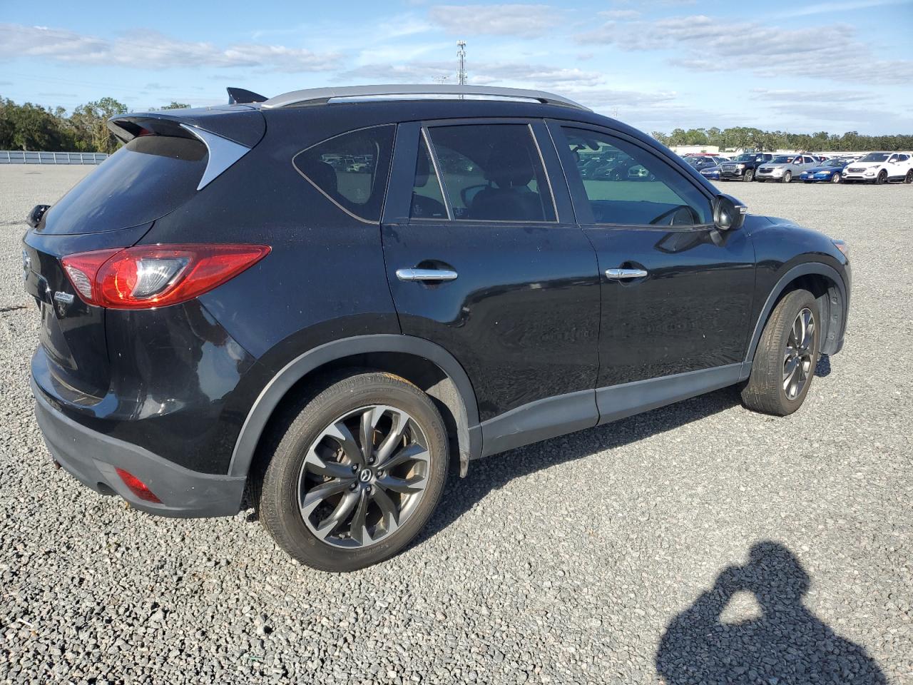2016 Mazda CX-5 VIN JM3KE2DY5G0696281 Copart auction photo, water/flood damage thumbnail 3