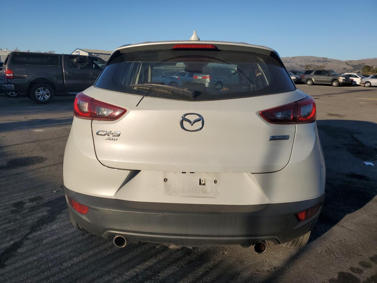 2018 Mazda CX-3 VIN JM1DKFB78J0317177 Copart auction photo, front end / side damage thumbnail 6