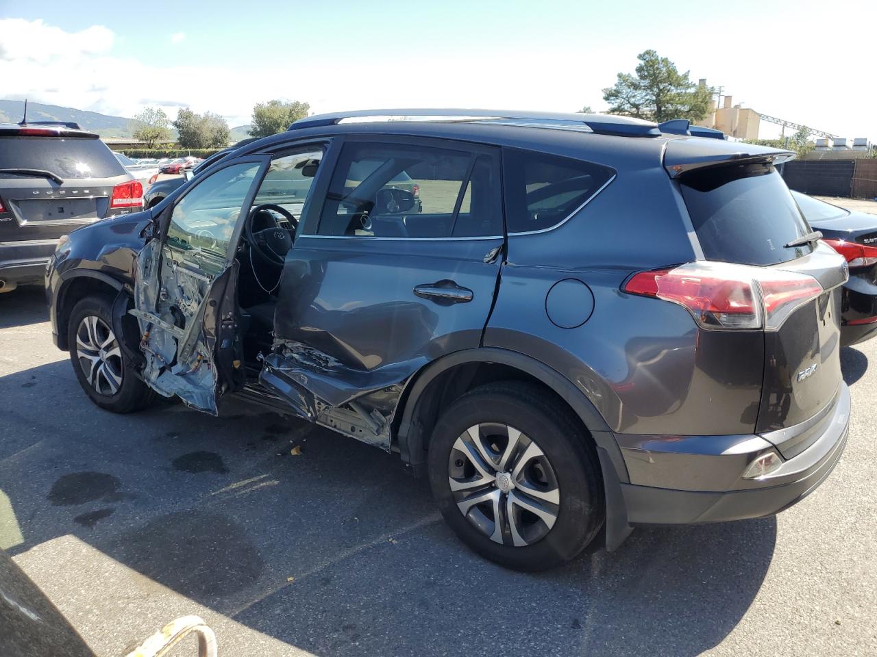 2017 Toyota RAV 4 VIN JTMZFREV8HJ131018 Copart auction photo, side / front end damage thumbnail 2
