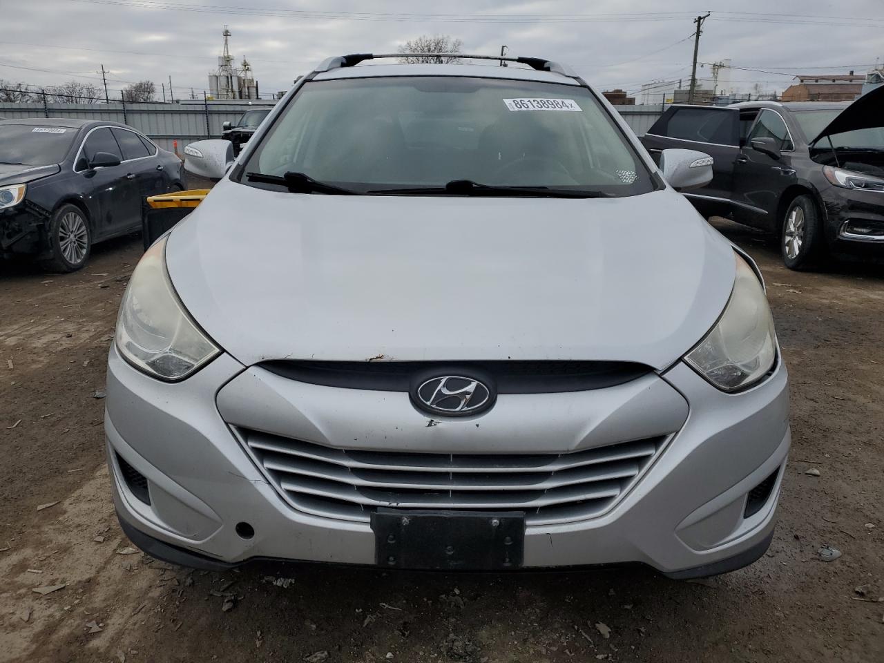2012 Hyundai Tucson VIN KM8JU3AC5CU402544 Copart auction photo, all over damage thumbnail 5