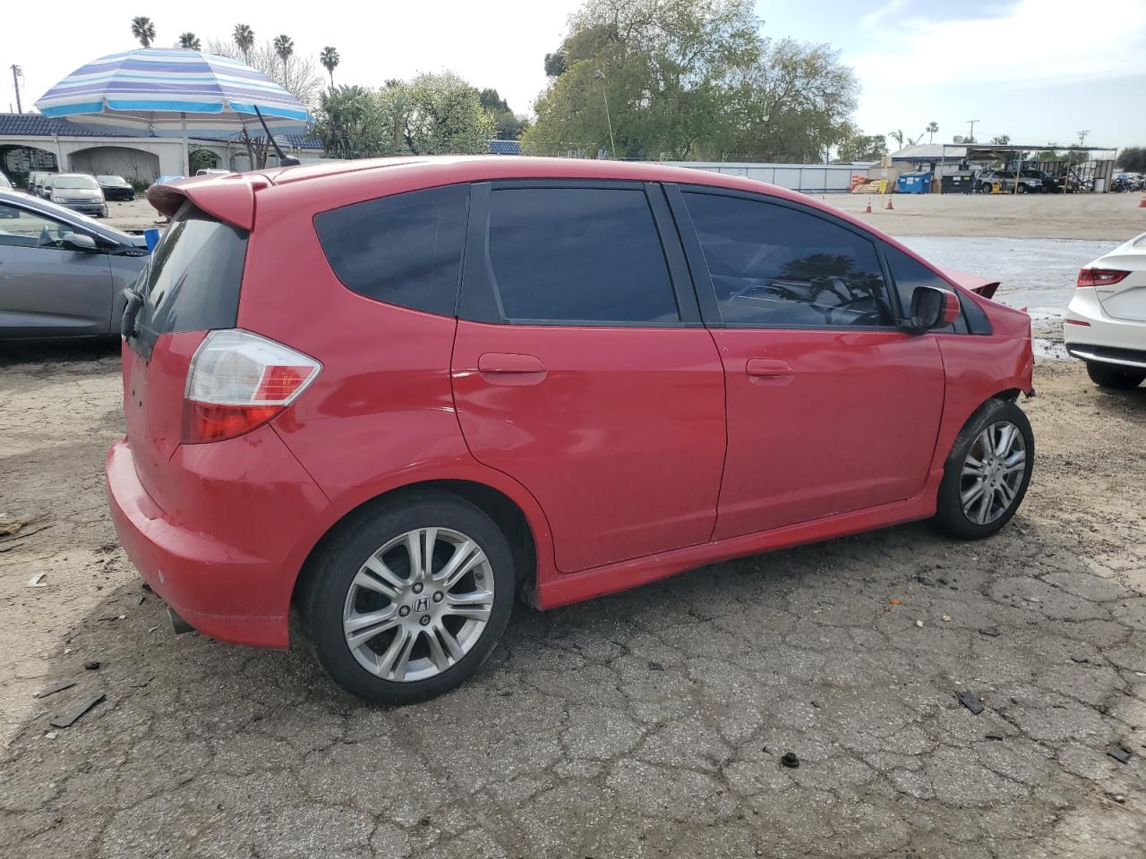 2009 Honda Fit VIN JHMGE88469S063948 Copart auction photo, front end / minor dent/scratches damage thumbnail 3