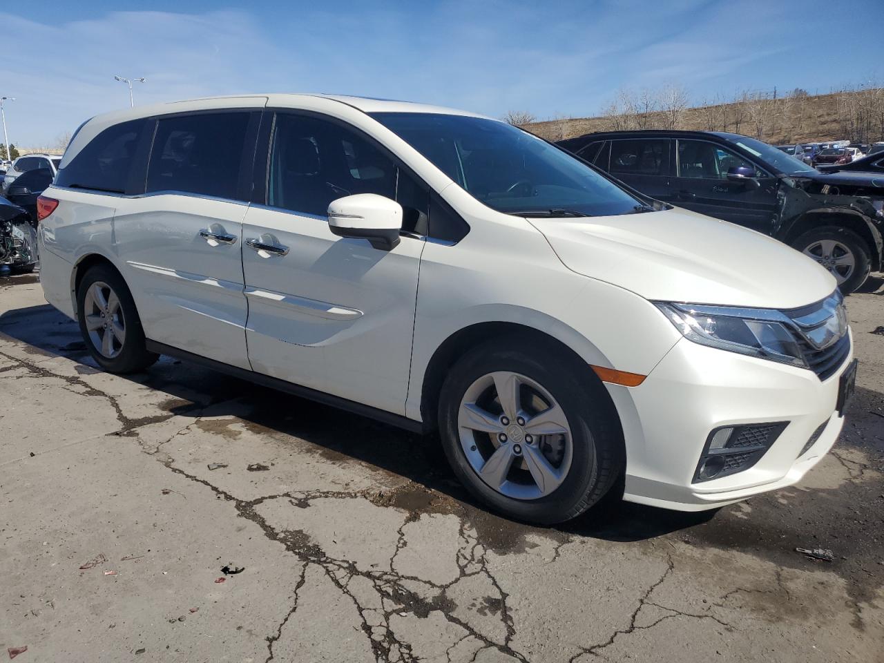 2018 Honda Odyssey VIN 5FNRL6H72JB083193 Copart auction photo, undercarriage / minor dent/scratches damage thumbnail 4