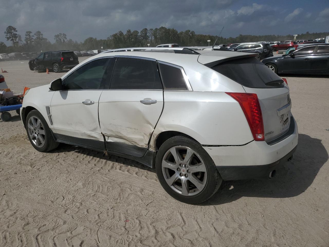 2012 Cadillac SRX VIN 3GYFNFE33CS621631 Copart auction photo, all over damage thumbnail 2