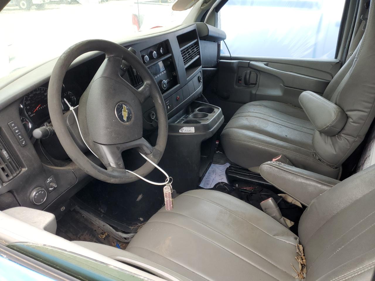 2011 Chevrolet Express VIN 1GCWGFCA6B1101019 Copart auction photo, side / front end damage thumbnail 7