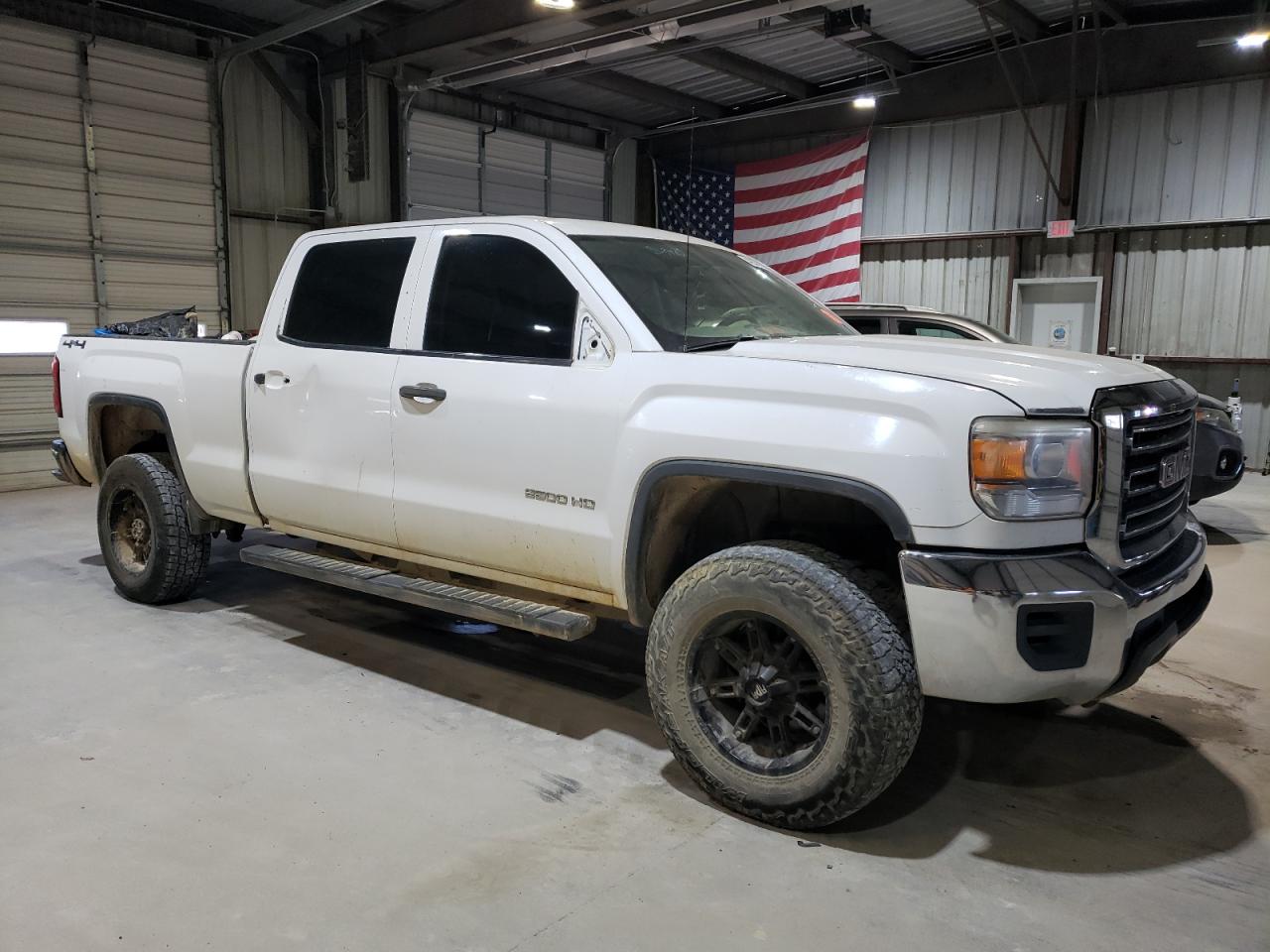 2015 GMC Sierra VIN 1GT12XEG0FF630197 Copart auction photo, rear end / side damage thumbnail 4