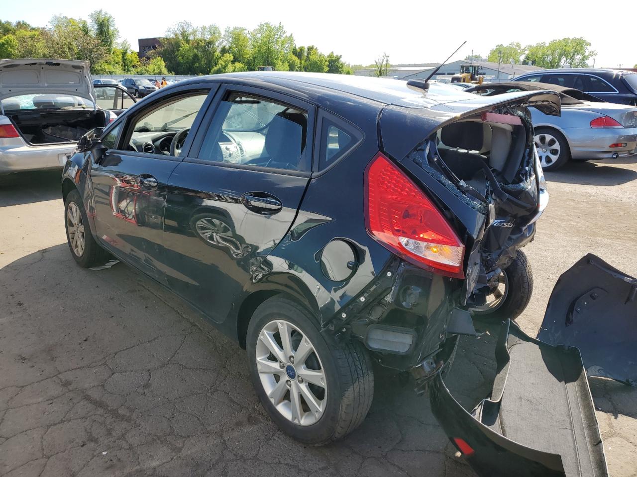 2012 Ford Fiesta VIN 3FADP4EJXCM136925 Copart auction photo, all over damage thumbnail 2