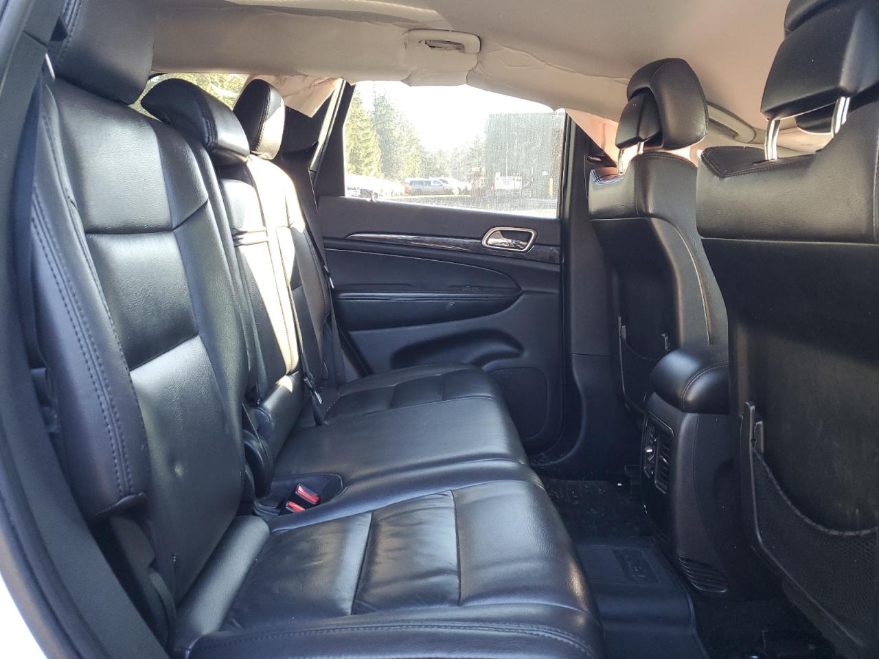 2012 Jeep Grand Cherokee VIN 1C4RJFAG9CC209209 Copart auction photo, all over damage thumbnail 11