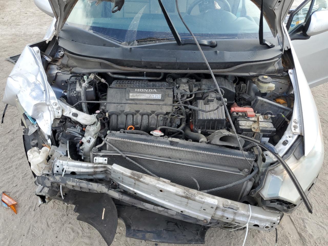 2010 Honda Insight VIN JHMZE2H53AS014015 Copart auction photo, front end damage thumbnail 11