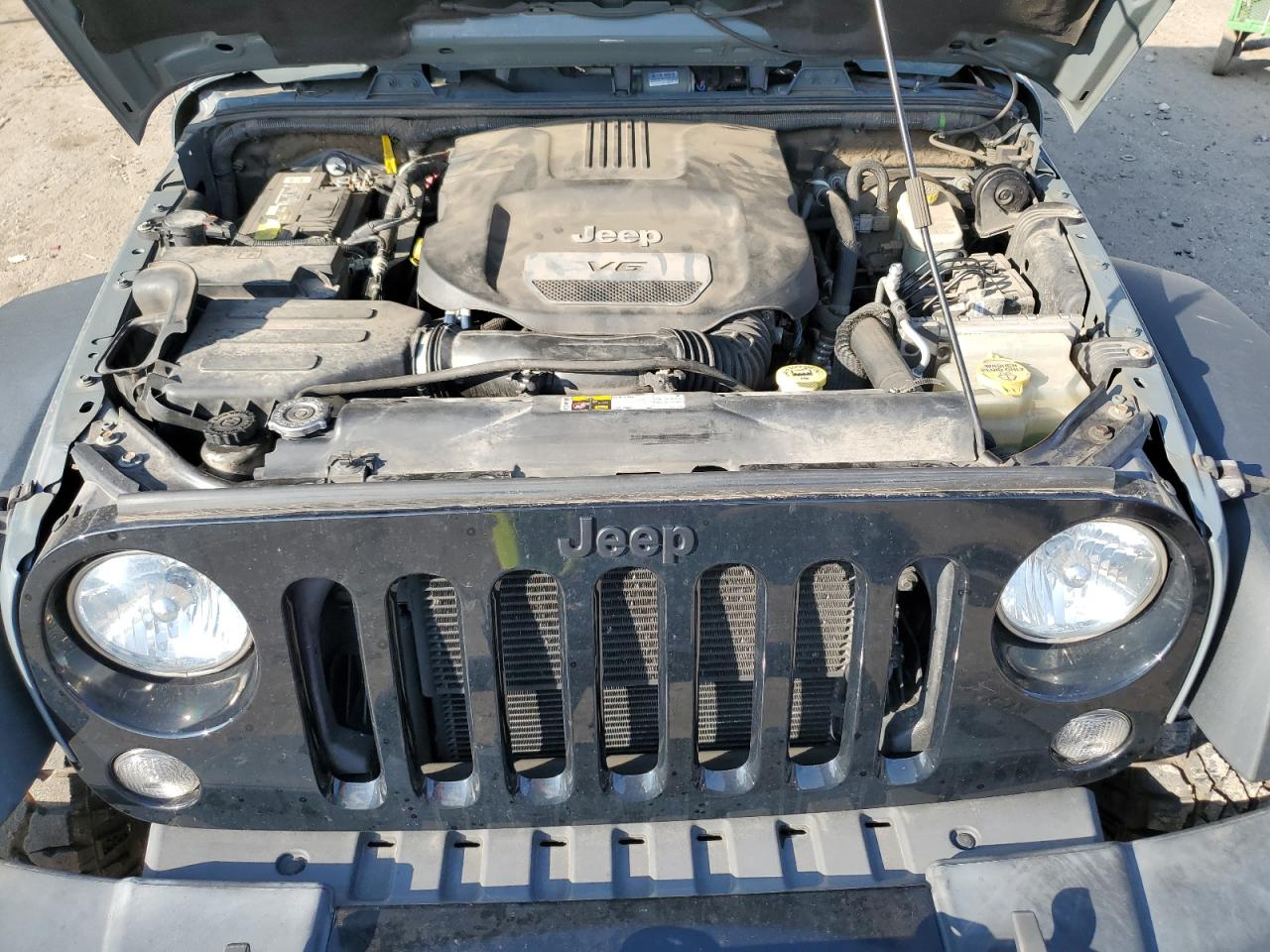 2015 Jeep Wrangler VIN 1C4BJWDG9FL579674 Copart auction photo, side / front end damage thumbnail 12