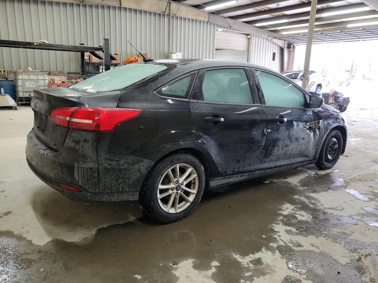 2016 Ford Focus VIN 1FADP3F27GL386003 Copart auction photo, side / minor dent/scratches damage thumbnail 3