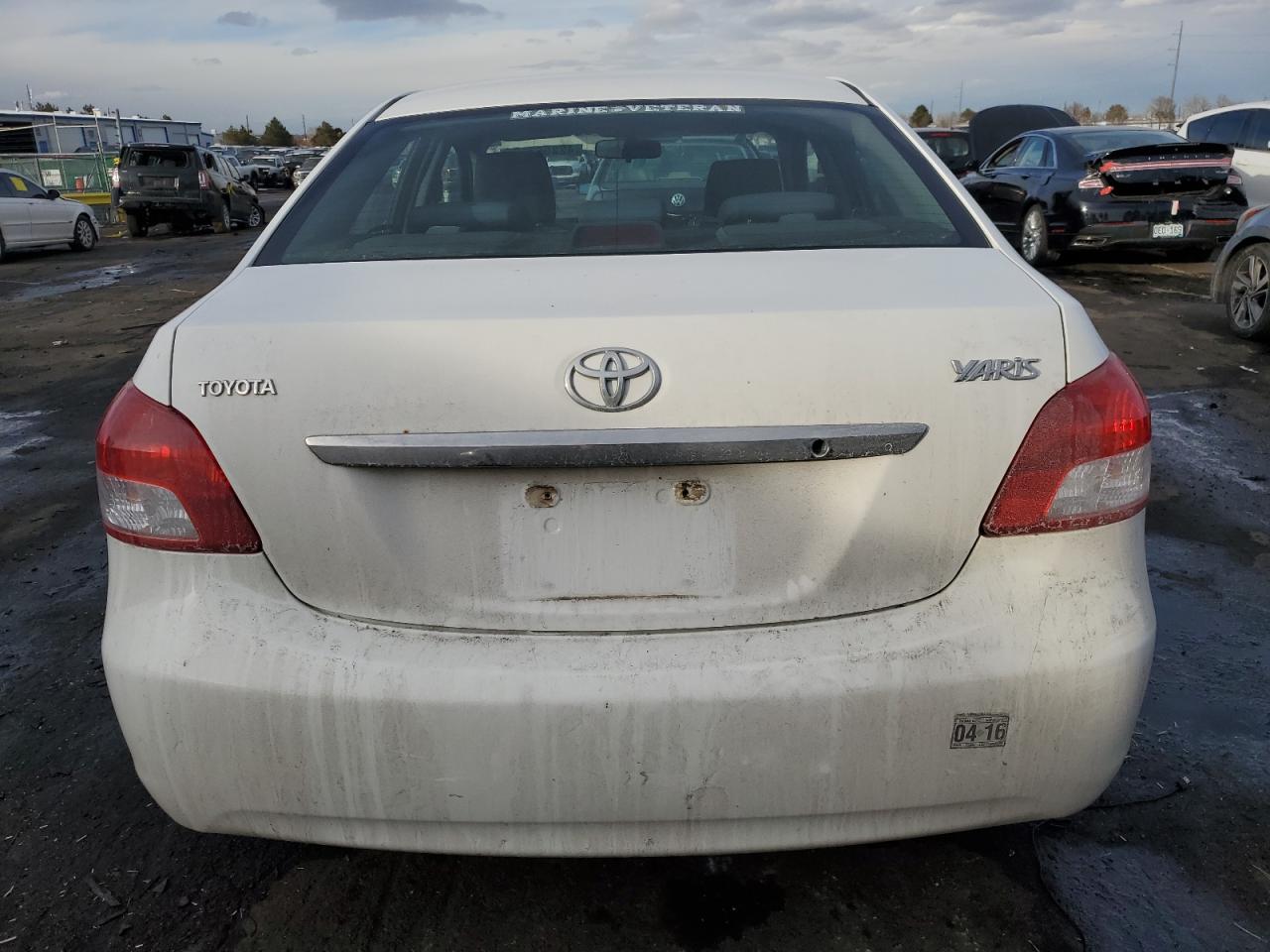 2009 Toyota Yaris VIN JTDBT903X91312252 Copart auction photo, side damage thumbnail 6