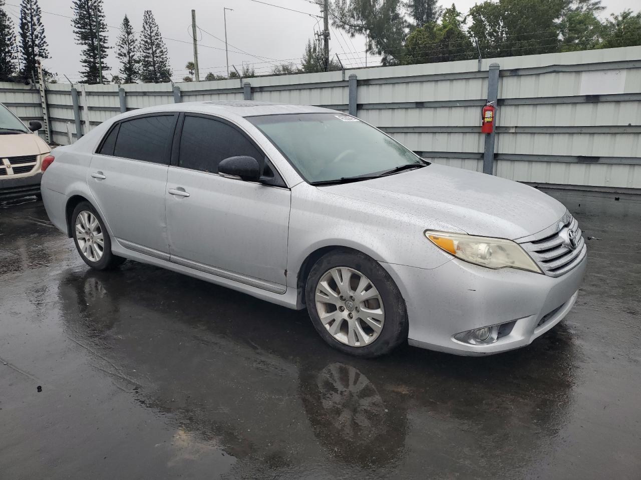 2011 Toyota Avalon VIN 4T1BK3DB7BU425223 Copart auction photo, side / front end damage thumbnail 4