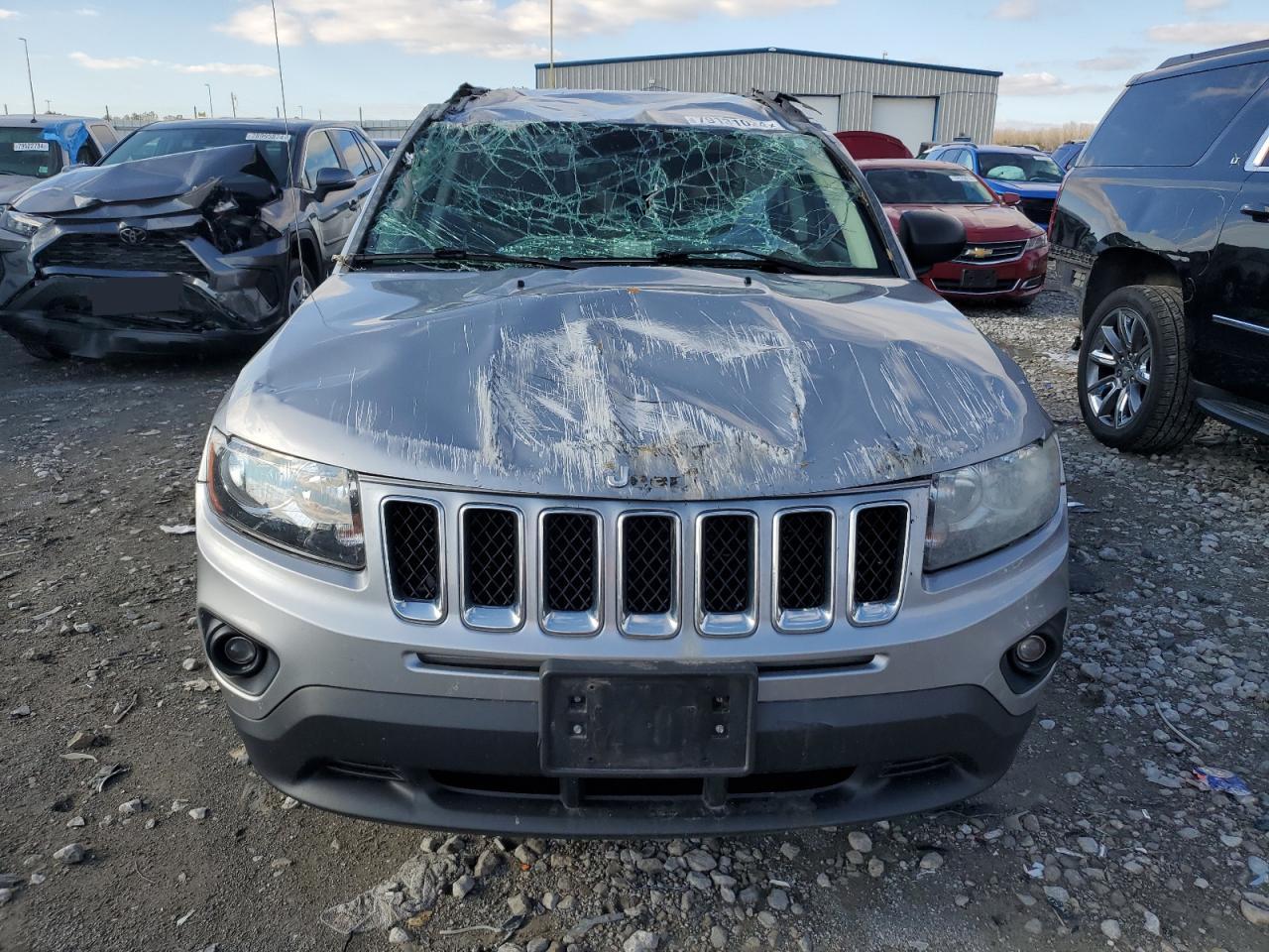2016 Jeep Compass VIN 1C4NJCBAXGD611019 Copart auction photo, all over damage thumbnail 5