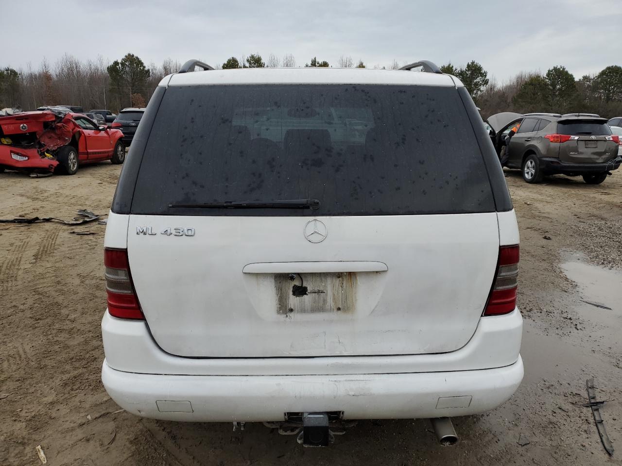 1999 Mercedes-Benz M-klasse VIN 4JGAB72EXXA057564 Copart auction photo, all over damage thumbnail 6