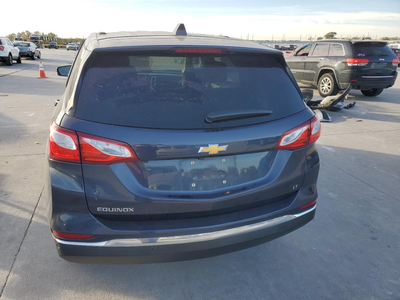 2018 Chevrolet Equinox VIN 3GNAXJEV9JS607672 Copart auction photo, side damage thumbnail 6
