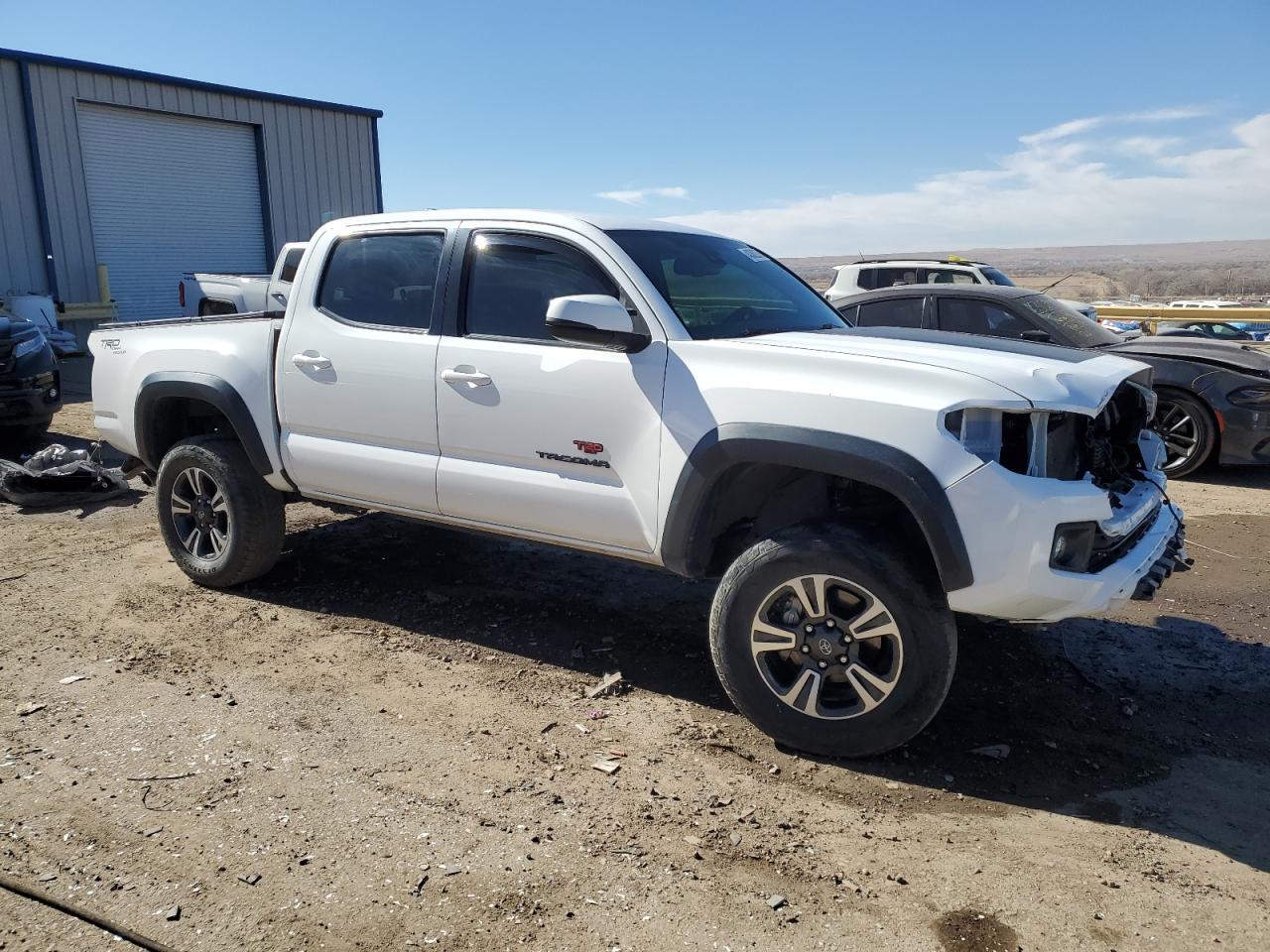 2018 Toyota Tacoma VIN 5TFCZ5AN2JX131188 Copart auction photo, rear end / front end damage thumbnail 4