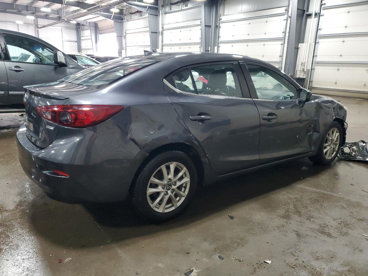 2014 Mazda 3 VIN JM1BM1W73E1131089 Copart auction photo, all over damage thumbnail 3